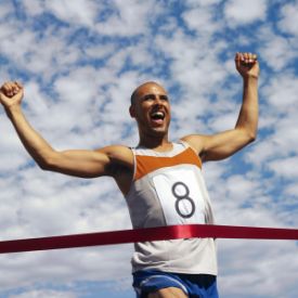 Runner crossing finish line