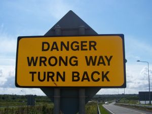 Danger, wrong way, turn back warning sign
