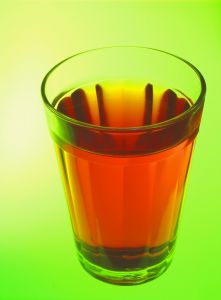 Glass of pink liquid (kool-aid)