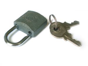 Opened padlock and keys