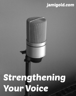 Microphone against a blank wall with text: Strengthening Your Voice