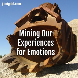 Giant digging bucket for mining equipment with text: Mining Our Experiences for Emotions