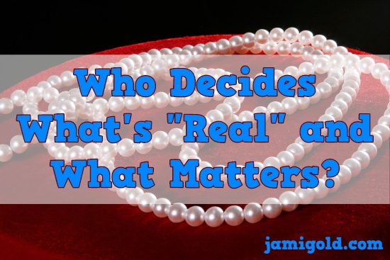 Pearl-style necklace with text: Who Decides What's "Real" and What Matters?